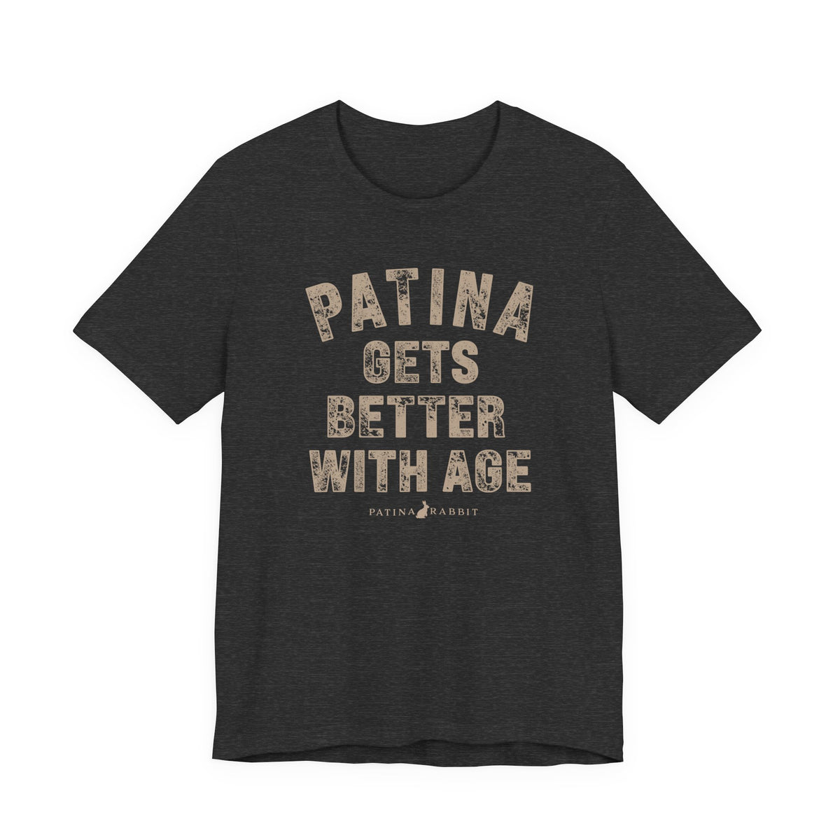 A heathered charcoal crewneck t-shirt with a distressed beige graphic text that reads 'PATINA GETS BETTER WITH AGE' and a small 'PATINA RABBIT' logo underneath, 